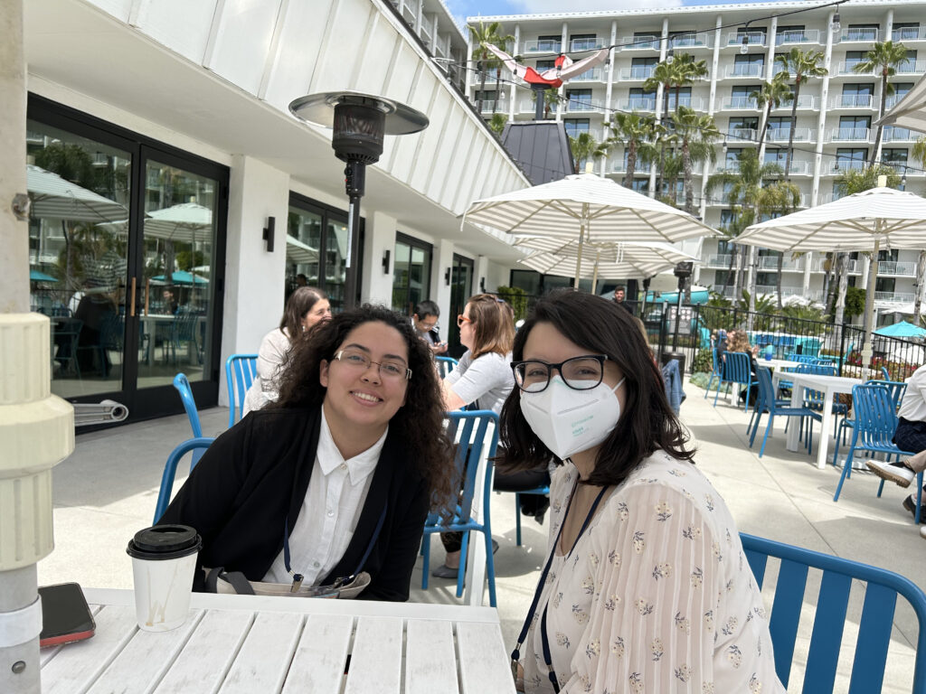Photo of Imalay & Sarina at SRA 2023, sitting outside