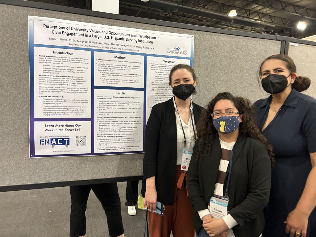 Photo of Manpreet, Sarina, & Stacy at SRA 2023, in front of their poster.